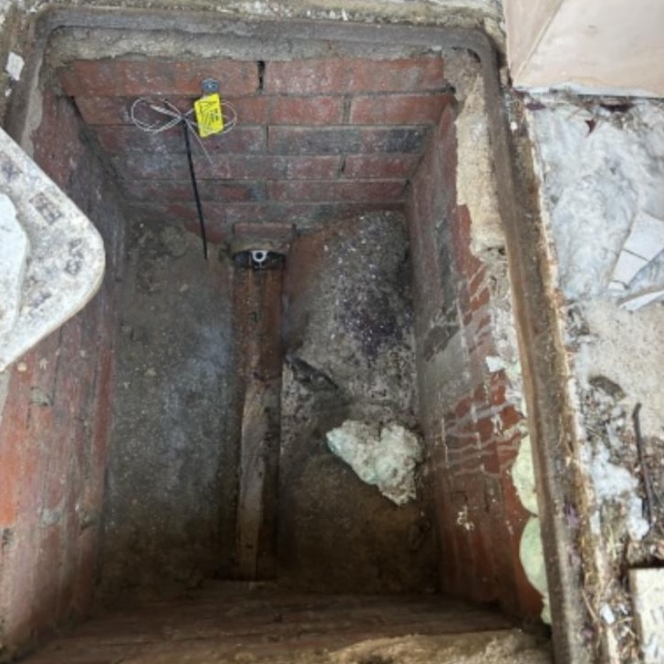 Rat drain blocker installation in progress