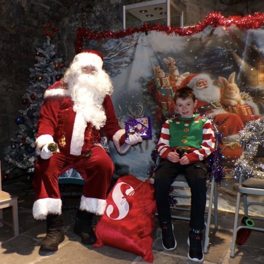 Santa giving a child a present