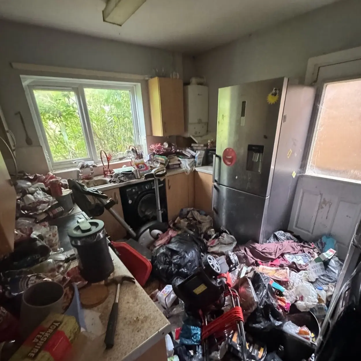 A mountain of rubbish in a social housing property