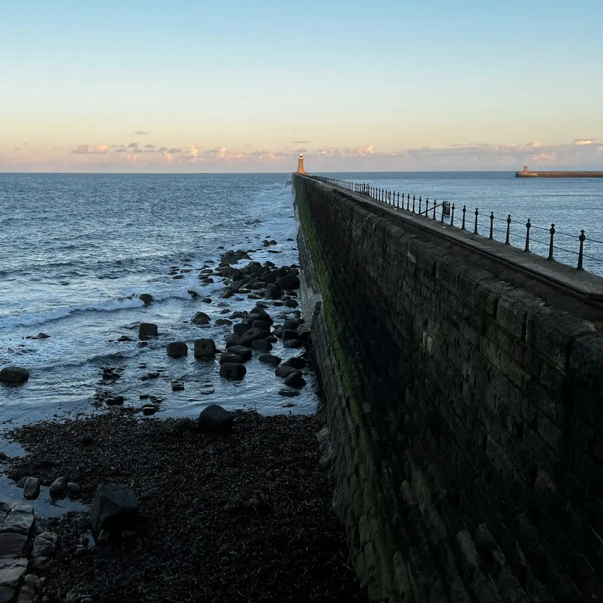 View of a lighthouse at the end of a pier in North Shields
